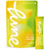 Lune Minerals Yuzu, Basil & Honeydew electrolyte drink mix pouch of 16 stick packs, with a single stick pack